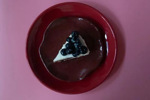 Delicious Slice of Blueberry Layer Cake on White Plate Stock Photos