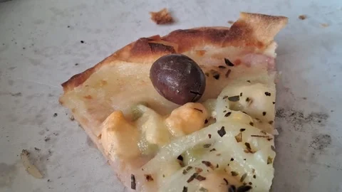 Delicious slice of pizza with black olive in motion video Stock Footage 337897100