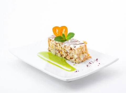 Delicious slice of white cake Stock Photos