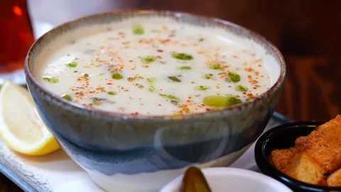 Delicious soup served with crispy bread bites Stock Footage 300069695