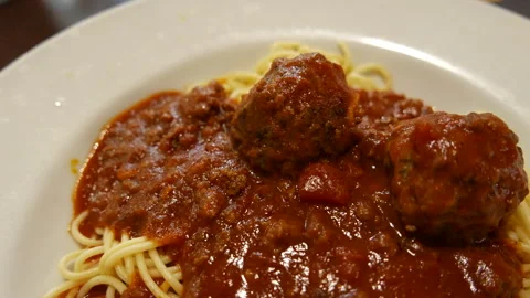 Delicious Spaghetti with Meatballs and Thick Tomato Meat Sauce Stock Footage 344952991