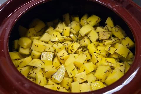 Delicious Spiced Mango Chunks in a Ceramic Bowl for Culinary Creations Stock Photos