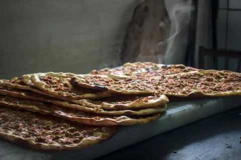 Delicious spicy and steamy stack of traditional Turkish pitas fresh out of ov Stock Photos