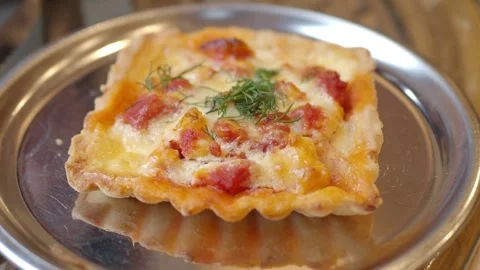 Delicious Square Tart with Melted Cheese and Tomatoes Stock Footage 335913092