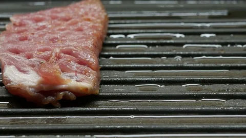 Delicious steak placed on hot grill garnish Stock Footage 82247281