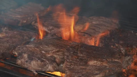 Delicious steaks on fire Stock Footage 201128615