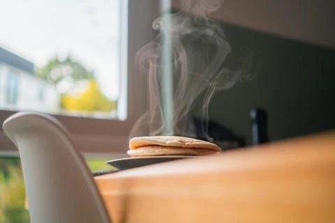 Delicious Steaming Stack of Delicious Homemade Pancakes Stock Photos