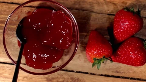 Delicious strawberry jam in close-up 스톡 동영상 151125945