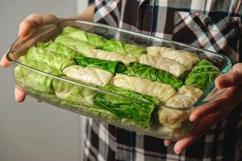 Delicious stuffed cabbage rolls ready for a cozy family meal gathering Stock Photos