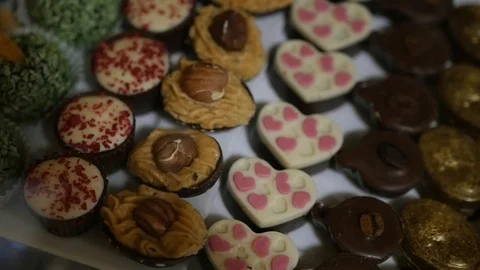 Delicious sweet candy in a showcase of different kinds. HD, 1920x1080, slow Stock Footage 85776798