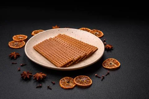 Delicious sweet crispy rectangular waffles on a ceramic plate 스톡 사진