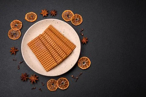 Delicious sweet crispy rectangular waffles on a ceramic plate 스톡 사진
