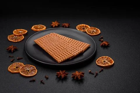 Delicious sweet crispy rectangular waffles on a ceramic plate 스톡 사진