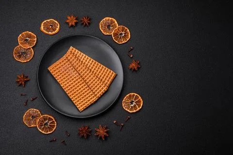 Delicious sweet crispy rectangular waffles on a ceramic plate Stockfoto's