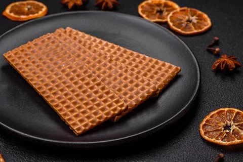 Delicious sweet crispy rectangular waffles on a ceramic plate 스톡 사진