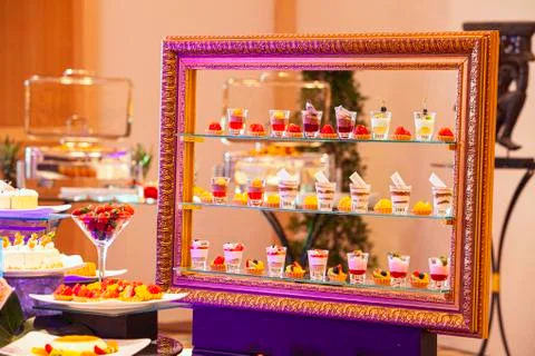 Delicious sweets on candy buffet Stock Photos