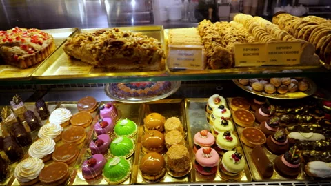 Delicious sweets on the shop window in the cafe, cakes, pastries, sweet pastries Stock Footage 255452069