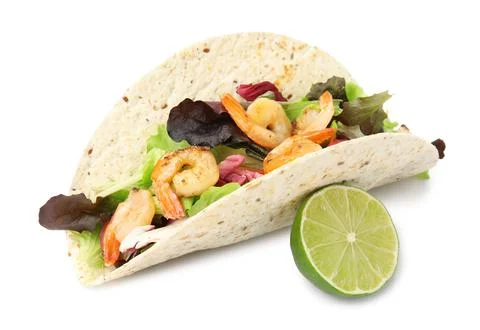 Delicious taco with shrimps and lime on white background Stock Photos