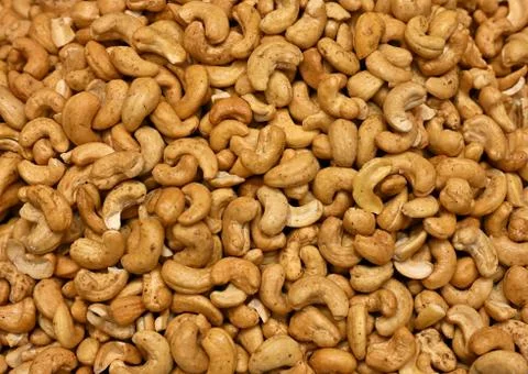 Delicious Tasty Roasted Cashew Nuts Background image Stock Photos