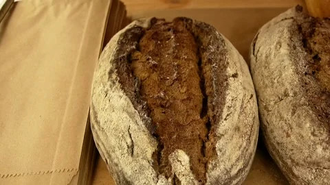 Delicious tender black bread close-up Stock Footage 337426833