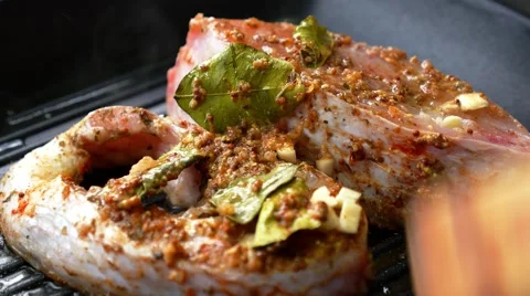 Delicious Tilapia Fish Steaks Roasting in the Frying Pan. Stockbeeldmateriaal 40739990
