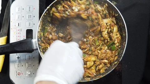Delicious vegetable frying pan is being stirred. Top down view. Ketogenic Stock Footage 116321550