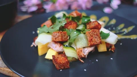 Delicious vegetable salad with mango and chicken Stock Footage 249079888