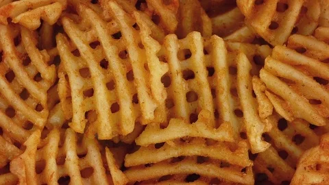 Delicious Waffle Cut Fries Stock Footage