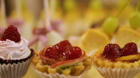 Delicious wedding reception candy bar dessert table Stock Footage 72923962
