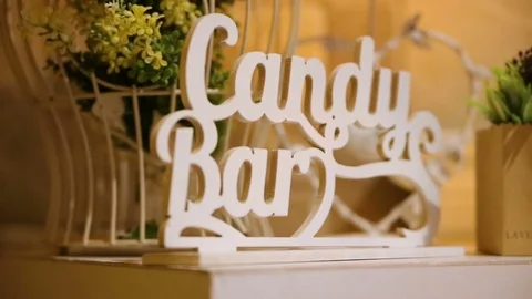Delicious wedding reception candy bar dessert table Stock Footage 72924386