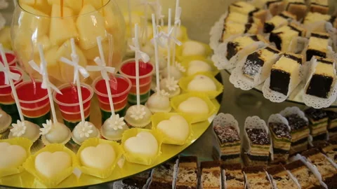 Delicious wedding reception candy bar dessert table Stock Footage 86275383