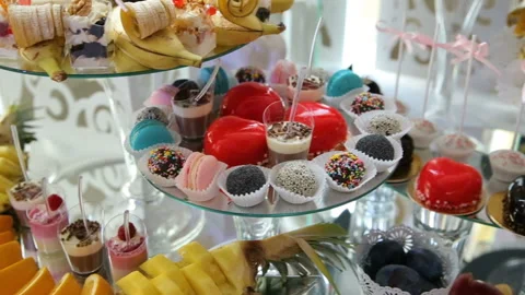 Delicious wedding reception candy bar dessert table Stock Footage 87658047