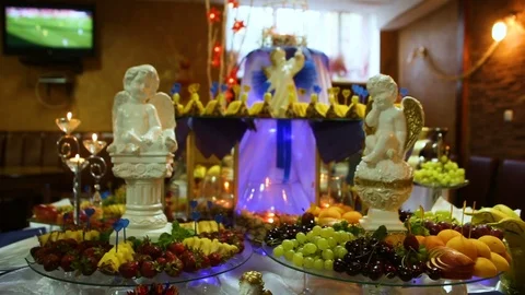 Delicious wedding reception candy bar dessert table of the celebration hall Stock Footage 95638694