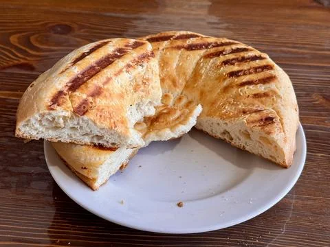 A Deliciously Freshly Baked Flatbread Featuring EyeCatching Grilled Patterns on 스톡 사진