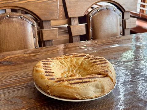 A Deliciously Freshly Baked Flatbread Featuring EyeCatching Grilled Patterns on 스톡 사진