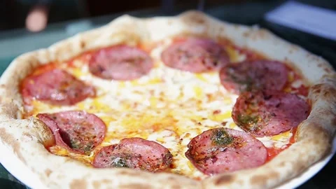 A deliciously prepared pizza on the table Video stock 271363422