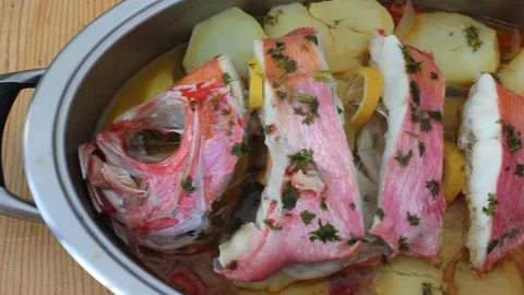 Delidious red bream with potatoes Stock Footage 236941264