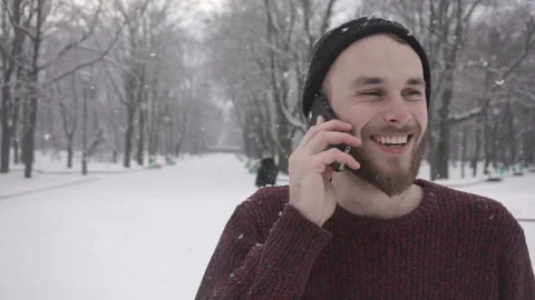 Delight happy handsome man calling friends to wish Merry Christmas Stock Footage 85592332