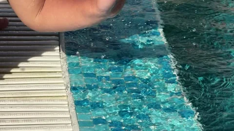 Delight of Water Splashing at the Poolside Stock Footage 304969556