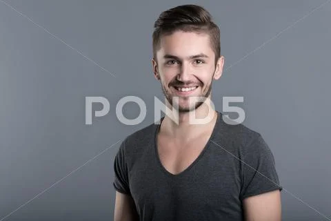 Delighted bearded man smiling Stock Photos