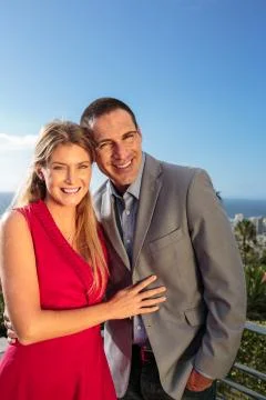 Delighted couple gesturing in front of the camera Stock Photos