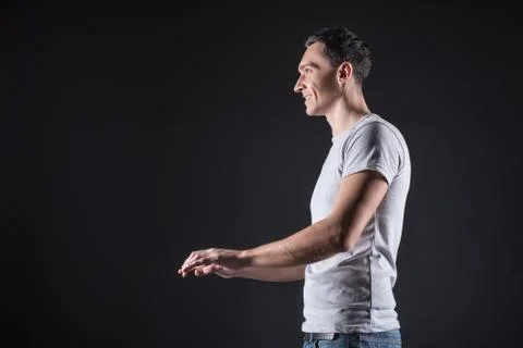 Delighted handsome programmer typing text Stock Photos