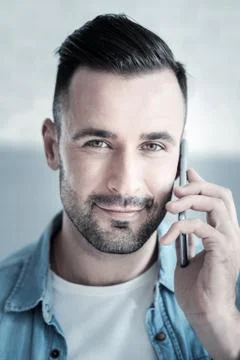 Delighted nice man looking at you Stock Photos