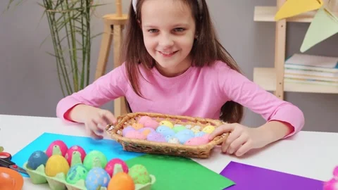 Delighted smiling joyful brown haired little girl wearing bunny ears headband 動画素材 293239692