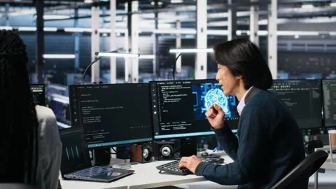 Delighted team in data center celebrating finishing neural network development Stock Footage 313566451