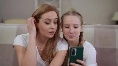 A Delightful and Engaging Moment Shared Between a Mother and Her Daughter  Stock Footage 295421706