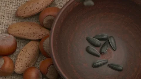 A delightful assortment of mixed nuts and seeds presented beautifully in a Видео 289833217