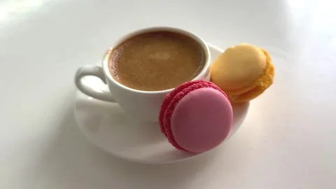 Delightful coffee and macarons create a perfect morning moment Stock-Footage 310651984
