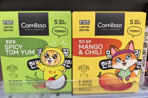 Delightful coffee boxes featuring playful characters and enticing flavors Stock Photos