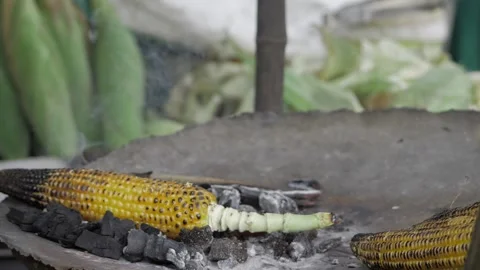 Delightful Corn Cooked to Perfection - A Culinary Delight Stock Footage 320874482